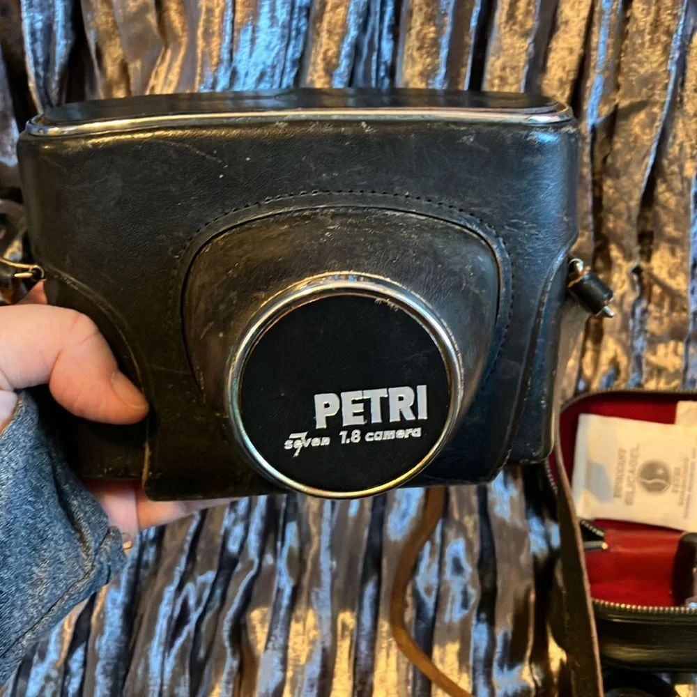 Petri 7 1.8 Camera 35mm, 2 additional Lens, & Popular fan flash reflector
